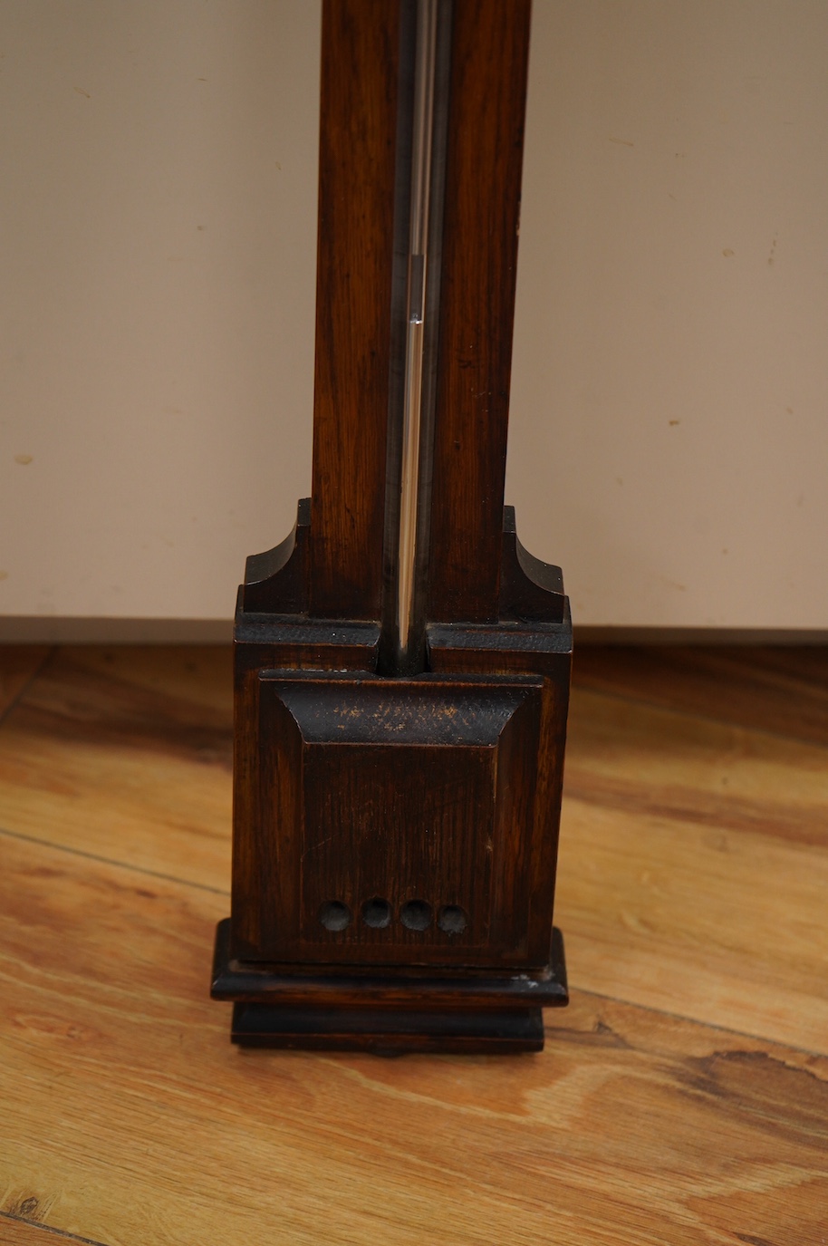 A Negretti and Zambra 'Farmer's' barometer, oak stick barometer with ceramic scales. Condition - fair, one scale broken with piece present.